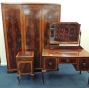 QUALITY MAHOGANY THREE-PIECE BEDROOM SUITE, comprising triple-door wardrobe, with figured mahogany