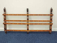 DUTCH WALNUT & INLAID PLATE RACK, late 19th century, carved with three grotesque masks, inlaid