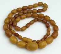 BUTTERSCOTCH AMBER BEADED NECKLACE, largest bead 20mms, gross weight 30g Provenance: private