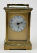 FRENCH GILT BRASS FOUR-GLASS CARRIAGE CLOCK, enamel dial with blue Arabic numerals, movement stamped