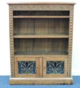 CARVED OAK OPEN BOOKCASE, fitted with leaded glass doors to the base, 118 (h) x 92 (w) x 32.5cms (d)