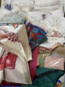ASSORTED TEXTILES, including head scarves, shawls, tableware, etc. Provenance: private collection