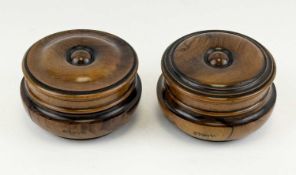 PAIR OF JERUSALEM OLIVEWOOD CIRCULAR LIDDED POTS, inscribed in Hebrew, 8.5cms (diam.) Provenance: