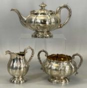 SILVER THREE-PIECE EMBOSSED TEA SERVICE, London 1824/25, approx. 41ozt gross Provenance: private