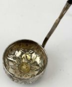 GEORGIAN WHITE METAL TODDY LADLE, the bowl inset with gilded 1762 3d coin, baleen handle, 34cms (