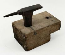 JEWELLER'S CAST IRON ANVIL, mounted on wooden base, 17 (h) x 23 (l) x 11cms (w) overall