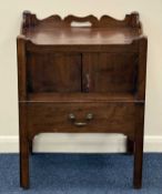 GEORGE III MAHOGANY NIGHTSTAND, raised back and sides over double cupboard and pull-out stand,