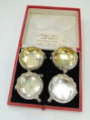 COMPOSITE SET OF FOUR GEORGE III SILVER TABLE SALTS, 7cms (d), 7.1ozt Provenance: private collection