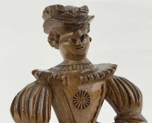 FOLK ART CARVED WOOD FIGURE of a lady in Elizabethan type dress, late 19th century, similar in style