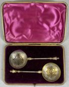 PAIR OF VICTORIAN SILVER GILT SIFTER SPOONS, with figural handles, chased and pierced bowls,