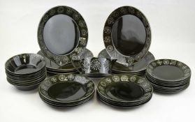 PORTMEIRION TOTEM PATTERN GREEN GLAZED DINNERWARE, nine plates, 26cms (diam.); eight plates,