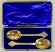 PAIR OF EDWARD VII SILVER LACE BACK SERVING SPOONS, with gilded bowls, William Hutton & Sons Ltd.,