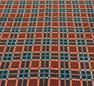 TRADITIONAL WELSH WOOLLEN BLANKET, finished in red, blue, and green, 210 x 225cms Provenance: