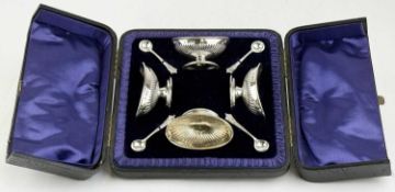 CASED SET OF FOUR EDWARD VII SILVER SALTS, open form with gadrooned decoration and gilded bowls,