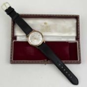 GARRARD 9CT GOLD GENT'S AUTOMATIC WRISTWATCH, with presentation inscribed back dated 1969, 34mms (