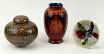 POOLE DELPHIS RED GROUND VASE, 21cms (h); together with a studio pottery ginger jar, 16.5cms (h);