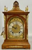 VICTORIAN BURR WALNUT BRACKET CLOCK, gilt mounted case with pineapple finials, arched brass dial