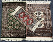 TURKISH PART SILK SMALL HANGING RUG, signed, 88 x 63cms; two further woollen rugs, smallest 60 x