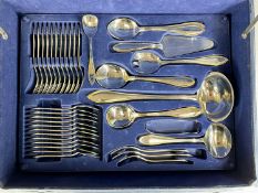 SUISSINE CANTEEN OF STAINLESS-STEEL CUTLERY with gold detail, 29 pieces, in blue case Provenance: