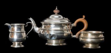 GEORGE V THREE-PIECE SILVER TEA SET, Mappin & Webb, Birmingham 1921/22, circular with lateral raised