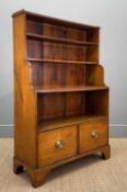 OAK & FRUITWOOD WATERFALL BOOKCASE, open shelves and fitted drawers, bracket feet, 133 (h) x 89 (