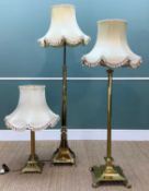 THREE GILT BRASS LAMPS, including two standard lamps with telescopic adjustable columns, one