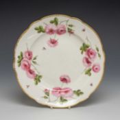 NANTGARW PORCELAIN PLATE, gilt dentil rim, decorated with enamelled pink roses in groups of three,