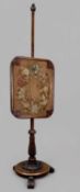 EARLY VICTORIAN ROSEWOOD POLE SCREEN, adjustable needlepoint panel on leaf carved column and base,