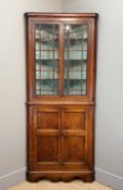 19TH C. OAK WELSH STANDING CORNER CABINET, checker banded frieze above reeded astragal glazed doors,