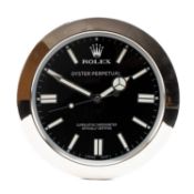 ROLEX-STYLE WALL CLOCK, modelled as an Oyster Perpetual watch, black dial, electric movement,