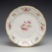 SWANSEA PORCELAIN CRUCIFORM CIRCULAR DISH, solid gilt rim with beaded border around sprigs of pink