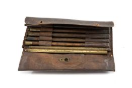 VICTORIAN INLAND REVENUE SET OF WOOD & BRASS SECTIONAL DIP ROD, in leather case of issue with