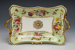 SWANSEA PORCELAIN TWIG-HANDLED DISH, non-moulded, gilt rim around apple green border, and with