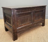 17TH C. JOINED OAK COFFER, flute carved panel front and sides, later double plank hinged lid