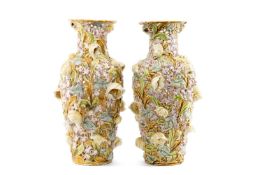 PAIR OF ZSOLNAY PECS FLOWER MOULDED VASES of baluster form, with pierced decoration, blue printed