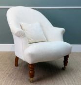 CRAPAUD STYLE ARMCHAIR, off-white cloth upholstery with matching cushion, turned front legs on brass