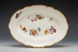 NANTGARW PORCELAIN OVAL DISH, typical moulded border within solid gilt rim, interior with sprays