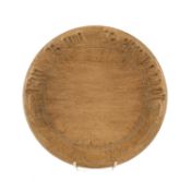WELSH SYCAMORE BREADBOARD, circular with relief-carved border 'Ein Bara Beunyddiol' (Our Daily