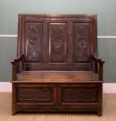WELL-CARVED JOINED OAK MONK'S BENCH, folding top decorated to the underside with three panels of