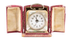 MOTHER OF PEARL BOUDOIR CLOCK, white enamel Roman dial, carry handle 5cms (w) Comments: damage to
