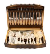 20TH C PLATED CANTEEN FOR SIX, William Rodgers, Sheffield, in stained case, celluloid knife handles.