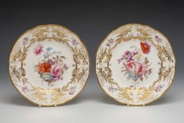 PAIR OF NANTGARW PORCELAIN PLATES, unmoulded border with elaborate gilding of cornucopia, foliage,