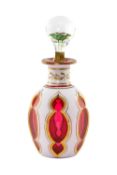 BOHEMIAN OVERLAID CRANBERRY GLASS SCENT BOTTLE & STOPPER, stopper with internal flower, gilt