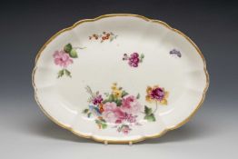 NANTGARW PORCELAIN OVAL DISH, solid gilt rim, decorated with roses and flowers, impressed Nantgarw