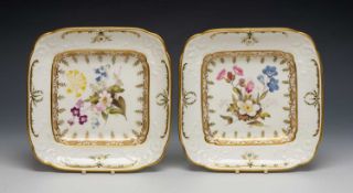 PAIR OF SWANSEA SQUARE DESSERT DISHES, moulded centred sprays of flowers, solid gilt rims, iron-