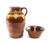 BUCKLEY SLIPWARE POTTERY EWER & DAIRY BOWL, pitcher half glazed with lateral shoulder stripes, 34cms