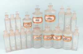 NUMBER OF LABELLED & CLEAR CHEMIST JARS, tallest 24cms (h) (19) Provenance: The collection of Philip