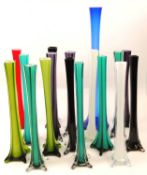COLLECTION OF COLOURED & CASED WHITE GLASS STEM VASES, finished in purple, green, red, black, and