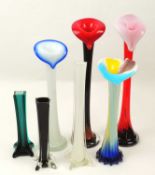 FOUR COLOURED GLASS ORCHID / STEM VASES, tallest 41cms (h), smallest 30cms (h); and three further