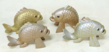 FOUR DECORATIVE CAST METAL FISH FORM WATERSPOUTS, 31 (h) x 41cms (l) Provenance: The collection of